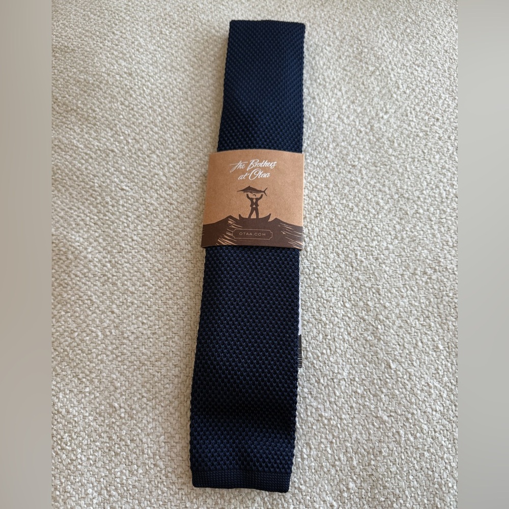 The brothers at Otaa Navy knit tie